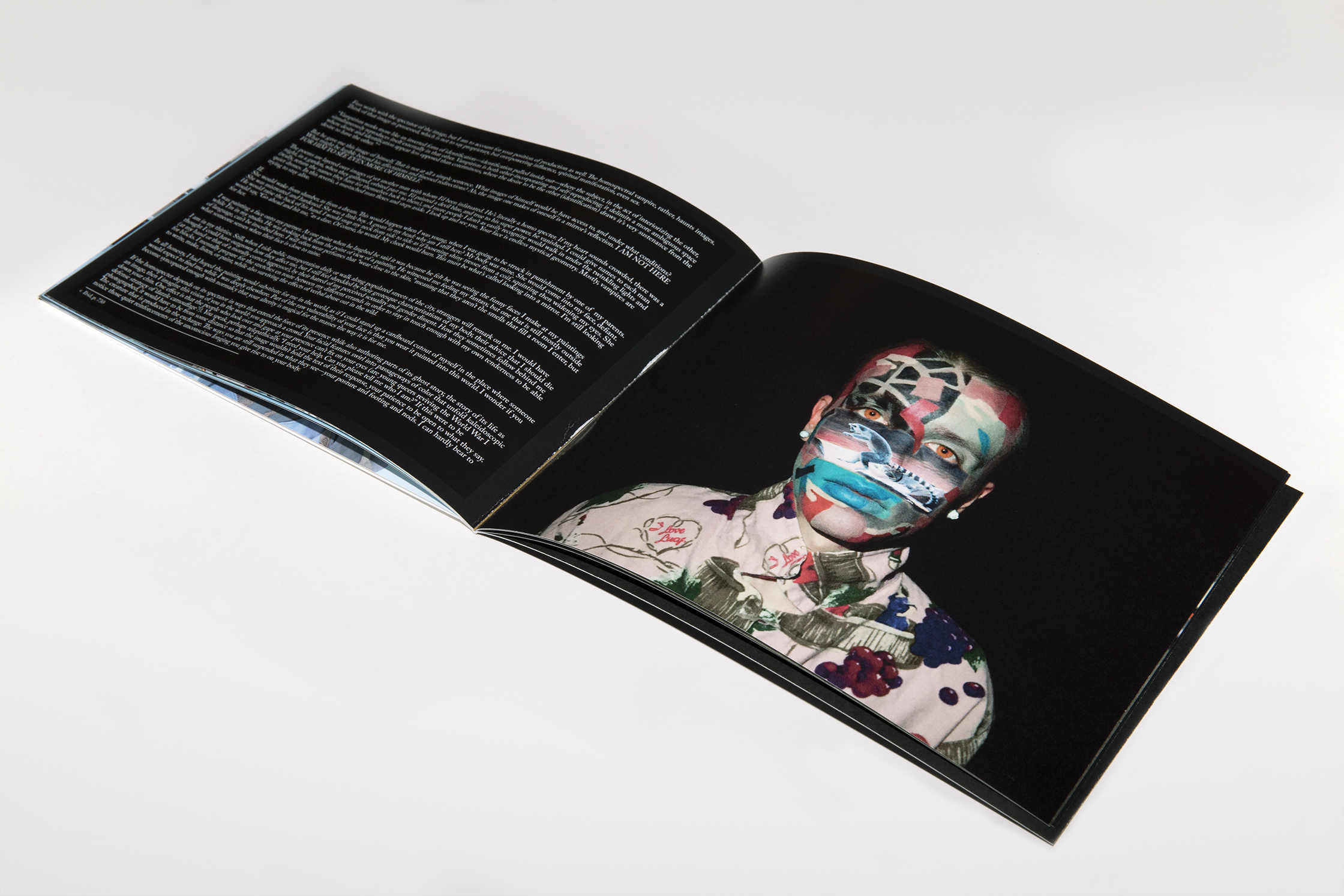 Two page spread in Imago with text on one page and a stylized portrait on the other